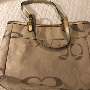 Beautiful Coach handbag with gold scents